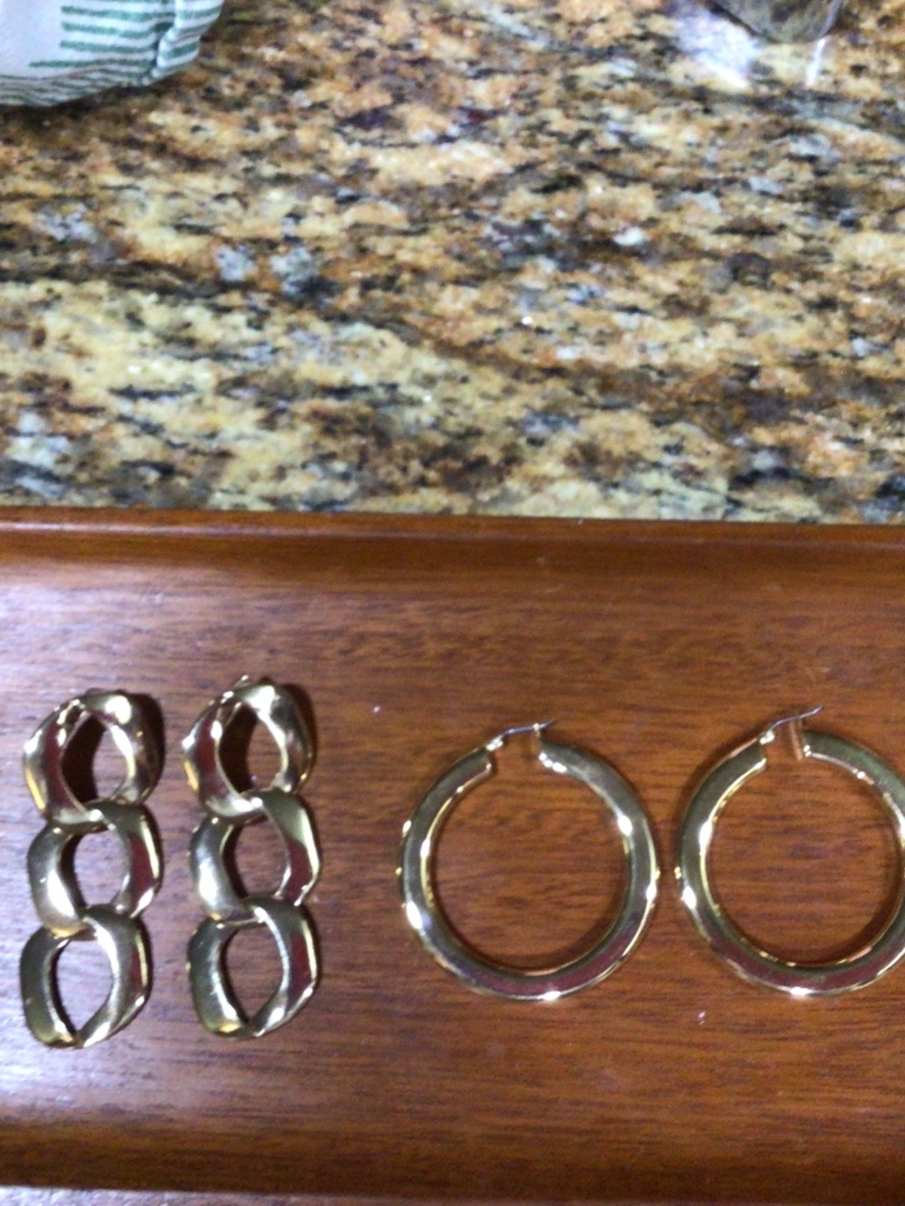 Two pair of goldtone earrings. The gold finish is in great shape